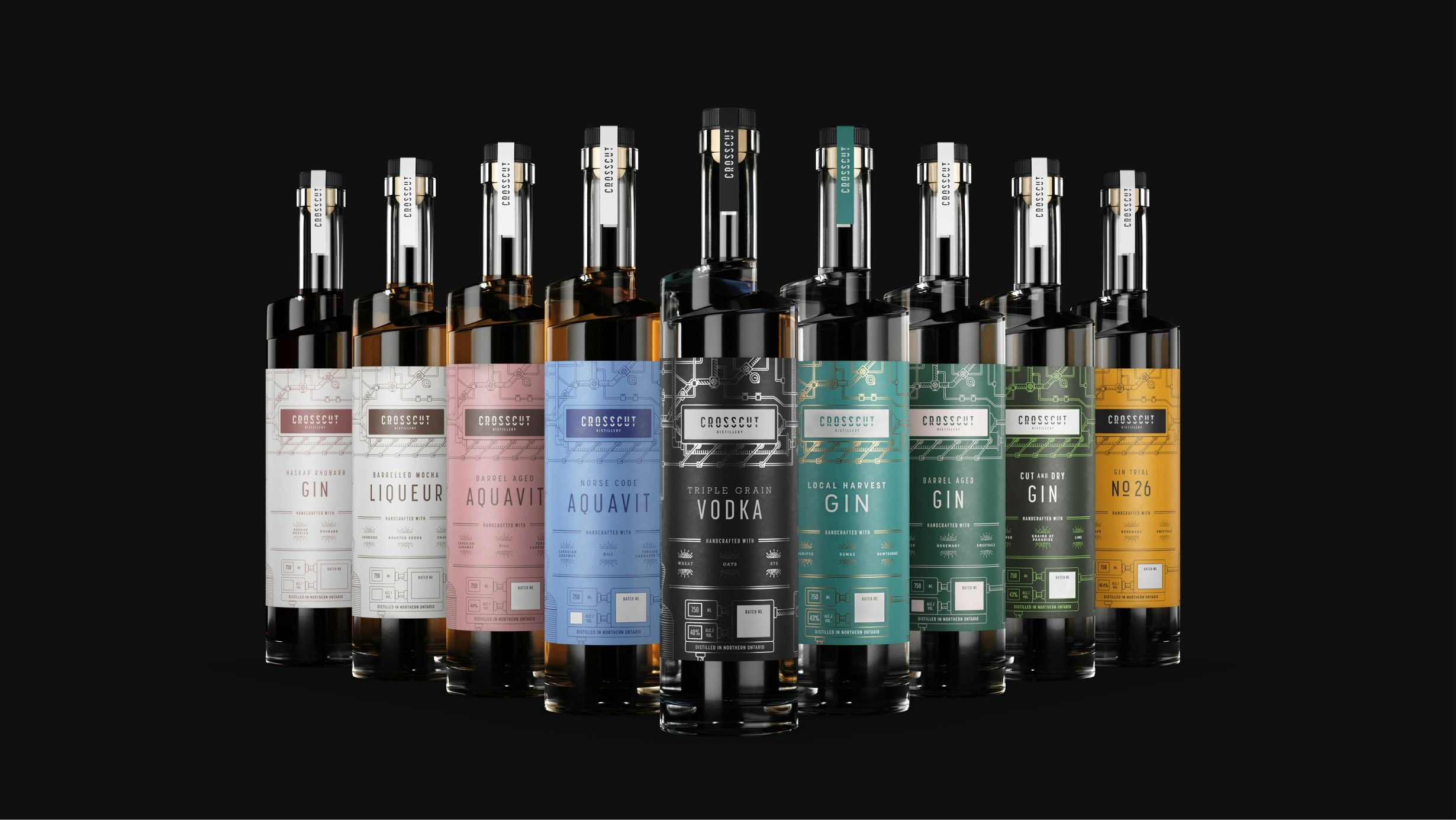 Colourful lineup of nine Crosscut Distillery bottles with branded labels