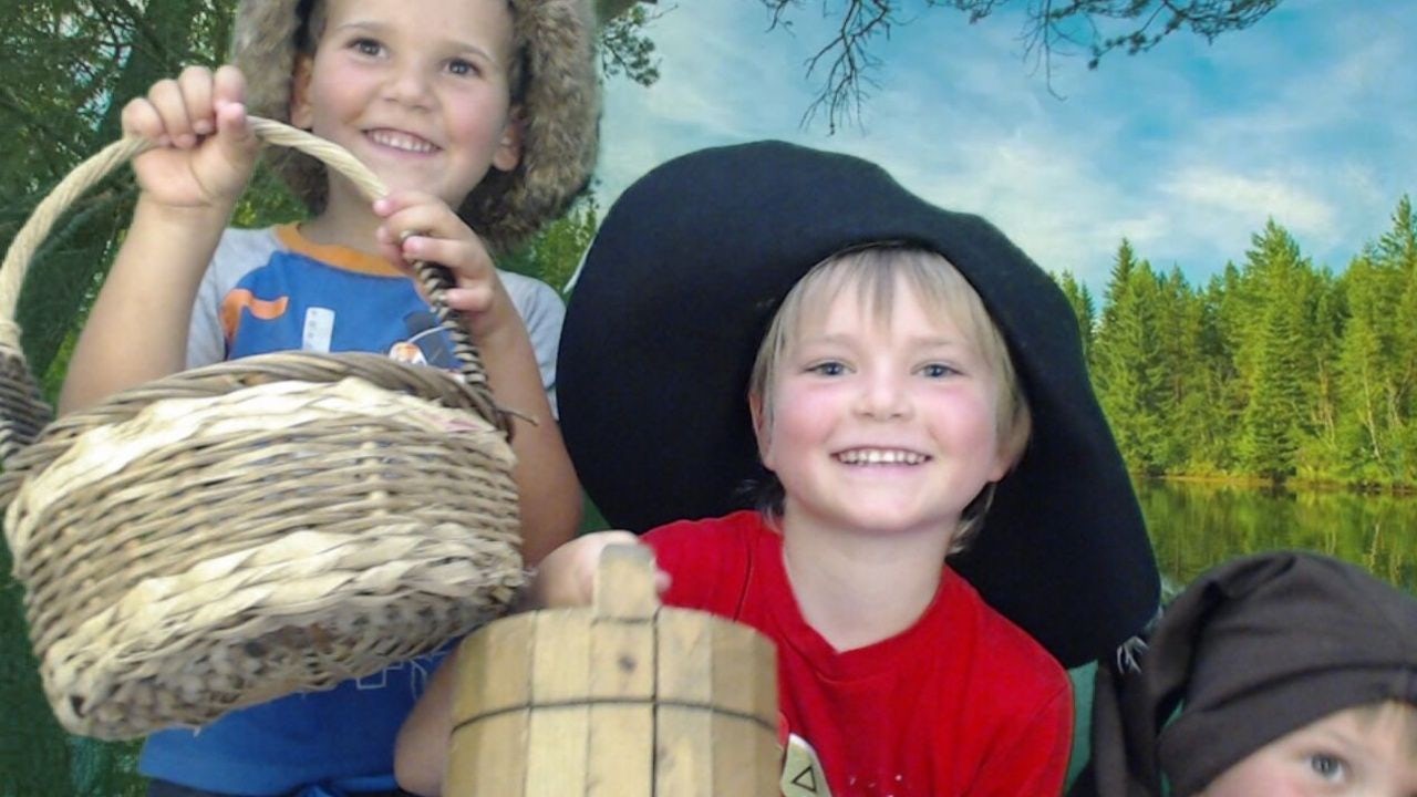 Kids enjoying the Champlain1615 interactive booth
