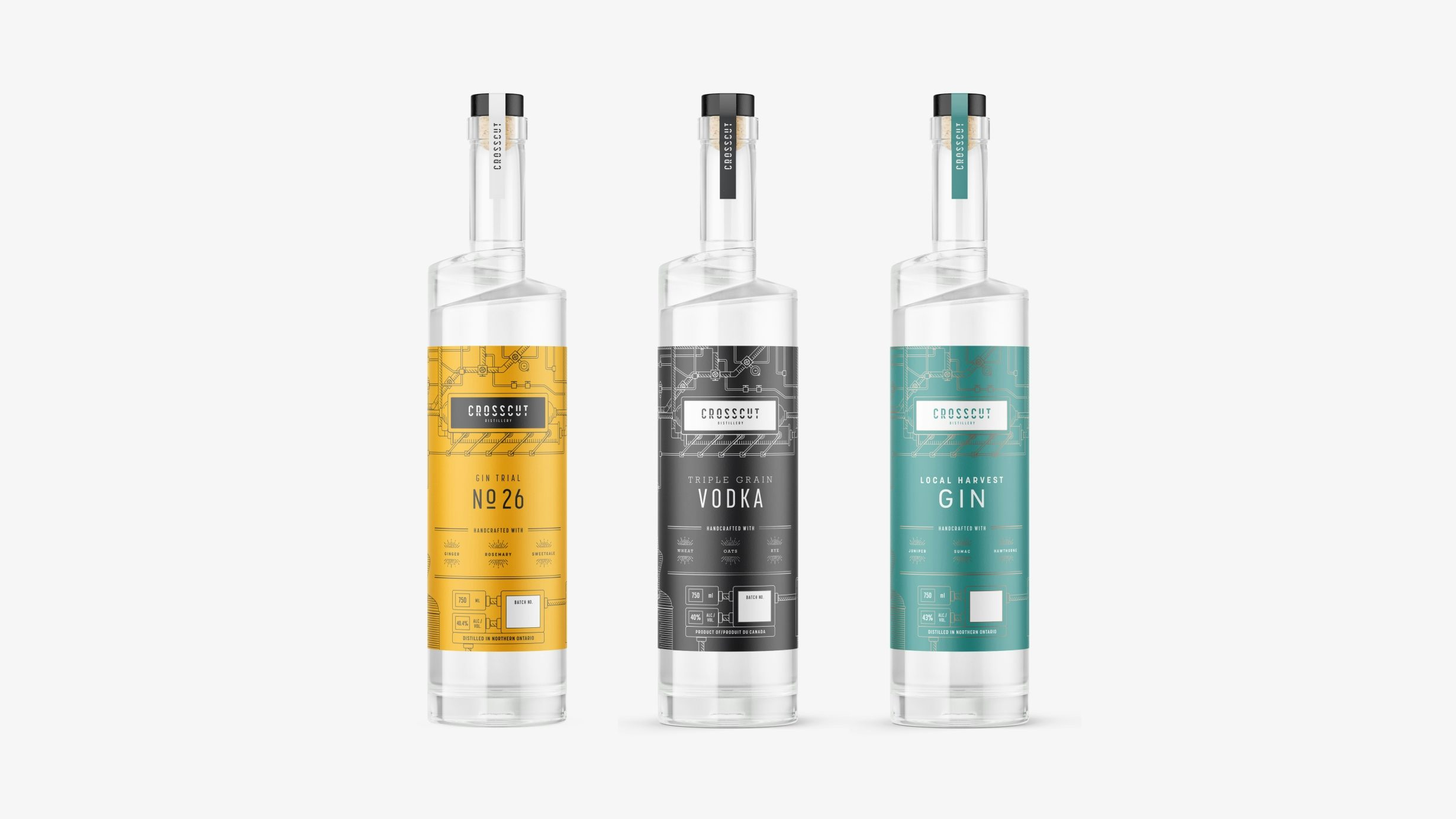 Trio of Crosscut Distillery bottles lined up side by side with colourful labels
