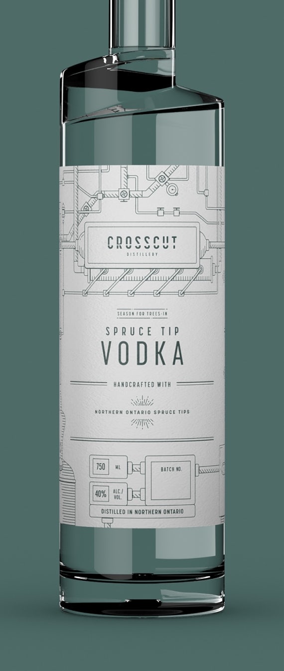 Crosscut Distillery's Spruce Tip Vodka bottle with white and dark green labels affixed